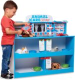 Melissa & Doug Wooden Animal Care Vet Activity Centre | Pretend Play | Vet Set for Kids | Large Vet Playset | Role Play Shop | Age 3+ | Gift for Boy or Girl - Image 4