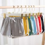 Rolanko Girls Sports Shorts, Cotton Summer Contrast Binding Dolphin Short Pants, Kids Athletic Gym Wear for Running and Dancing, 3 Packs - Image 6